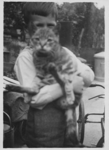 Colin with Charlie in back yard early 1950s.